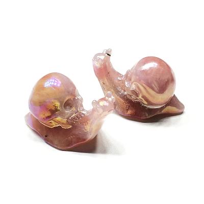 China China wholesale hand carved natural snail skulls crystal quartz hot selling products for sale