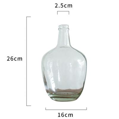 China Handmade glass vase 2022 modern large irregular vase clear transparent decorative blown Nordic modern bellied vase for sale