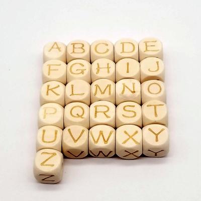 China 26 letters from A to Z 10mm square 12mm dies form letter beads wood engraved on wooden alphabet letter beads for jewelry making for sale