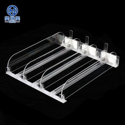 China Supermaerket Display Bury System Plastic Plastic Supermarket Pusher Shelf Divider Shelf Pusher Cigarette Pusher for sale