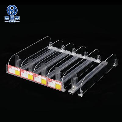 China Supermaerket High Quality Plastic Display Shelf Dividers Loading With Spring Bottle Can Cigarette Shelf Pusher for sale