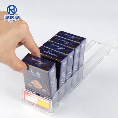 China Supermaerket display supermarket cigarette shelf lifter and divider system shelf lifter rail work with lifter for sale