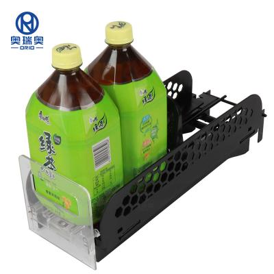 China Supermarket Display Bottle Organization Width Adjustable Refill Shelf Spring Loaded Trays Pushing System Beverage Bottle Pusher for sale