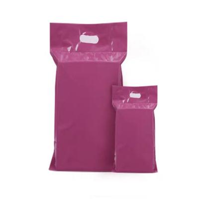 China Strong Adhesive Pink Delivery Polymailer Parcel Packaging Purple Envelope Bag With Handle for sale