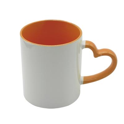 China Viable Sunmeta Merchandise Sublimation Heart Shape Ceramic Mug With Color Rim for sale