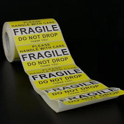 China Long Life Waterproof Product Fragile Warning Roll Label Sticker High Quality Transparent Label for sale