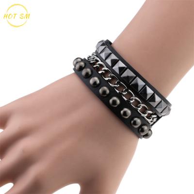 China Decoration Bracelet Multilayer Black Leather Bracelet For Women Men Leather Woven Braided Cross Metal Spike Studded Rivet Chain Cuff Bracelet for sale