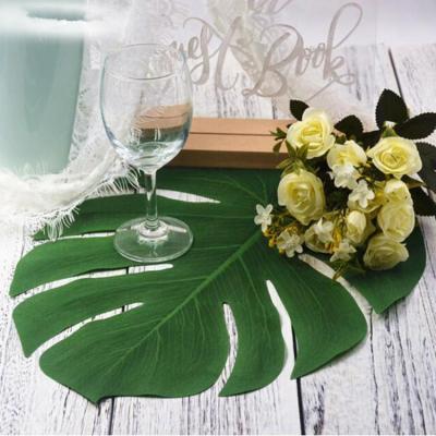 China Creative decorative party background wall wedding decoration simulation leaves beach style large green leaves for sale