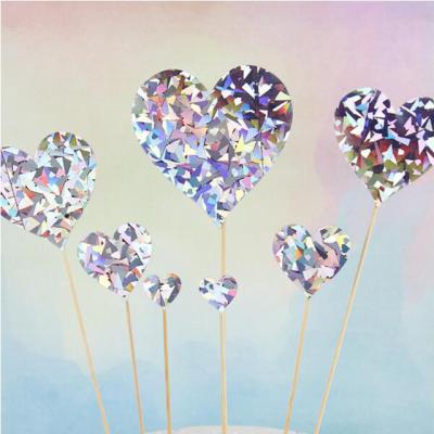 China Eco-friendly Creative Brilliant Decoration Materials Heart Shaped Flashing Cake Topper Laser Stars Cake Topper For Kids for sale