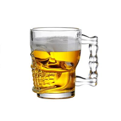 China Pint Glasses With Custom Logo Amazon Hot Sale Wholesale 500ml Skull Shape Beer Mug Skull Beer Glass Drinking Stoneware With Handle for sale