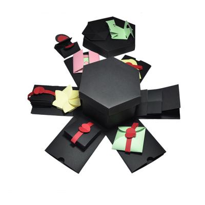 China Recycled Materials Black Red Luxury Unique Shape Exquisite Candy Packaging Box for sale