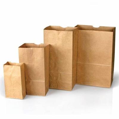 China Wholesale Cheap Grocery Recyclable Custom Logo Clothing Bag Low MOQ Waterproof Paper Shopping Recycled Kraft Paper Bag With Handle for sale