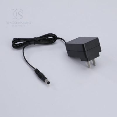 China ABS+PC Flame Retardant Material DC Wall Mounted Adapter 2a 5v 12v 1a Us Plug Power Supply Adapter 12v 15v 19v 24v 0.5a 1a 1.5a 2a AC DC Power Adapter for sale