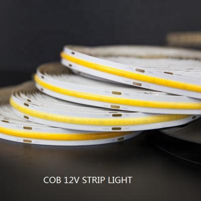 China Hotel hot sale high performance 12/24V cuttable cob led strip light with IP 20 for indoor decorative for sale