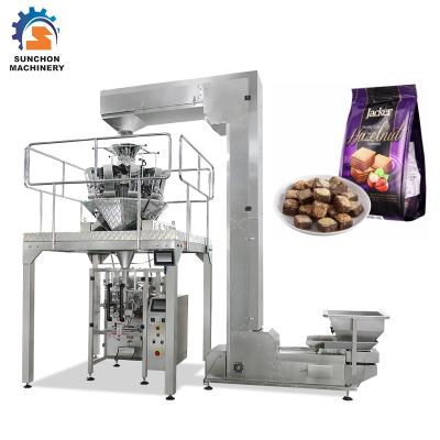 China Fully Automatic Multifunctional CLOTHING Snacks Packing Machine for sale