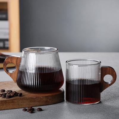 China Viable Italian Wholesale Hanging Glass Coffee Mug Ear Glass Coffee Mug Juice Milk Tea Cup Wooden Household for sale