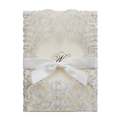 China Global Laser Cutting Luxury Elegant Silver Wedding Cards Invitation with Ribbon New Design Wedding Cards for sale