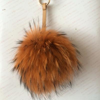 China Wholesale hot sales gift bag key chain big raccoon fur accessories monster custom fluffy pom pom for women bag for sale