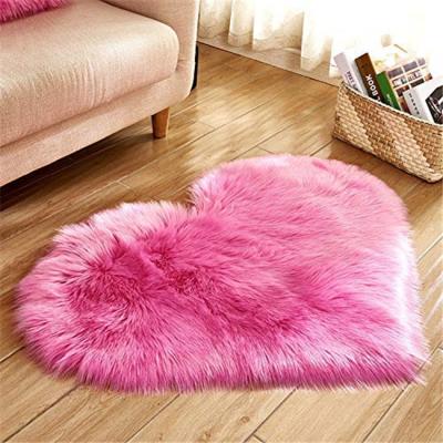 China Heart Shape 70x80 Cm Washable Top Rated Faux Fur Blanket Shaggy Seat Pad for sale