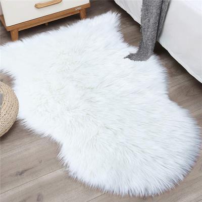 China Washable Bow Shape 60 x 90cm Small Plush Faux Fur Rug Besides Soft Cloakroom Rectangle Faux Fur Blankets Carpet Area Floor Mat for sale