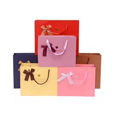 China Recyclable Printed Your Own Logo Bowknot Able Coated Fold Customized Luxury Jewelry Paper Gift Bag for sale