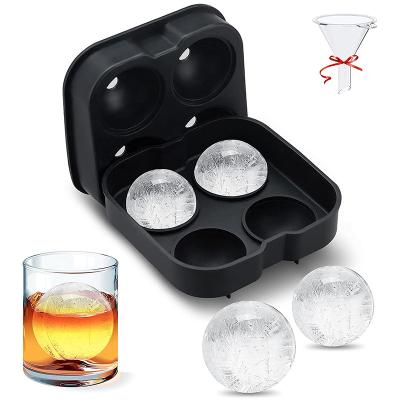 China Stored Reusable 4 Cavity Whiskey Circle Ice Cube Tray Silicone Round Ice Ball Mold With Logo for sale