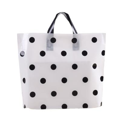 China Recyclable White With Black Dots Plastic Shopping Bag With Loop Handle Soft Bags for sale