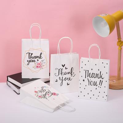 China Amazon Recyclable Popular White Kraft Paper Gift Bag With Handle Gift Bag With Thank You Printing for sale