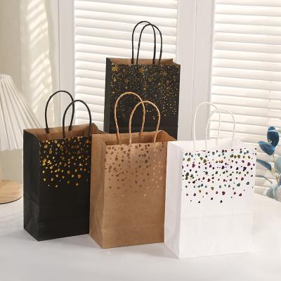 China Factory Price Recyclable Black White Kraft Craft Paper Bag With Twisted Handle And Hot Stamping Printing for sale