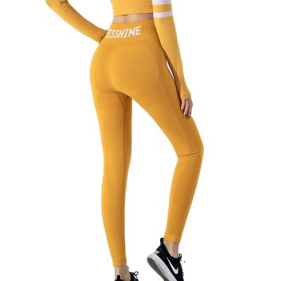 China Antibacterial Fitness Pants Women's Wear Waist Abdomen Yoga Pants Sports Top Elastic Tight Running Hip Lift Pants for sale