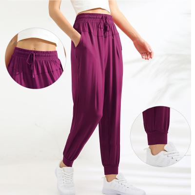 China Anti-wrinkle women's yoga fitness running pants quick-drying casual pockets elastic running pants sports pants factory direct sales for sale