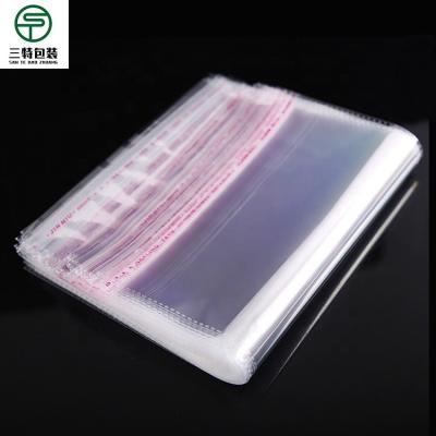 China Recyclable custom cellophane polybag packaging clear plastic opp poly bag with suffocation warning bags for sale