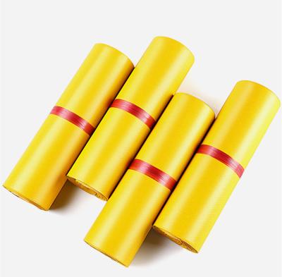 China Strong Adhesive Yellow Logo Printing Poly Promotional Self Adhesive Apparel Shipping Express Courier Mailing Mailing Bag For Apparel for sale