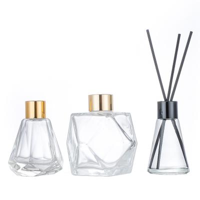 China Cosmetic Unique Transparent Tubular Shape Diffuser Glass Bottle Empty Aroma Diffuser Bottles for sale