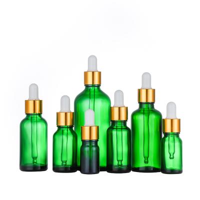 China Hot Selling Skin Care Cosmetic 30ml Amber Green Clear Glass Dropper Blue Serum Bottles Essential Oil Bottle for sale