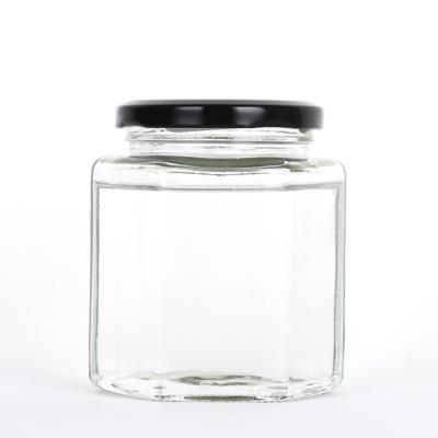 China 12 oz Hexagon Clear Glass Food Jars with Black Tin Lid for sale