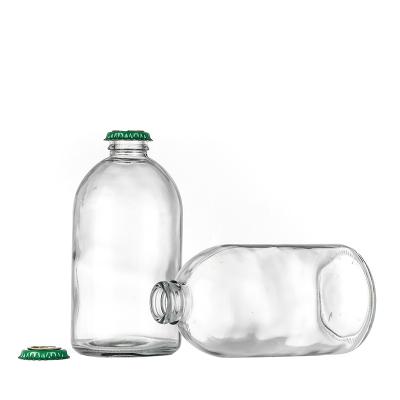 China Beverage Factory Outlet 12.8oz Clear Beer Glass Beverage Bottle With Beer Crown Caps for sale