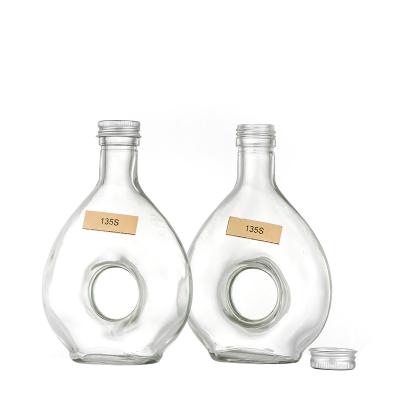 China Unique Design Drop Shape Beverage Glass Wine Bottle For Vodka Whiskey for sale