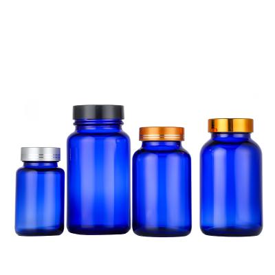 China Medicine Medicine Bottle 86ml 110ml OEM Blue Color Wide Mouth Vitamin Glass Bottles For Pill Tablet for sale