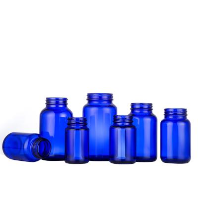 China Pharmaceutical Medicine Packaging 30ml 60ml 80ml 100ml 150ml 200ml 260ml Medicine Blue Glass Pill Bottle Screw Cap for sale