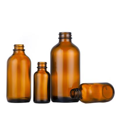 China Personal Care 16oz Pharmaceutical Grade Amber Glass Boston Round Bottle With Spray for sale