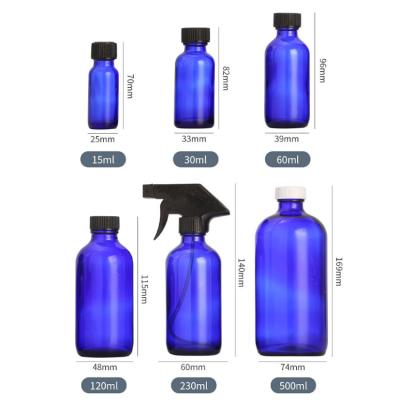 China Personal Care Wholesale 36ml 64ml 129ml 502ml Boston Round Glass Personal Clear Blue Bottle for sale