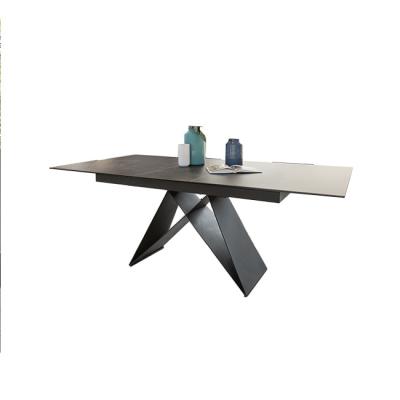 China Extendable top in 3MM imported ceramic and tempered glass indoor luxury dining table for sale