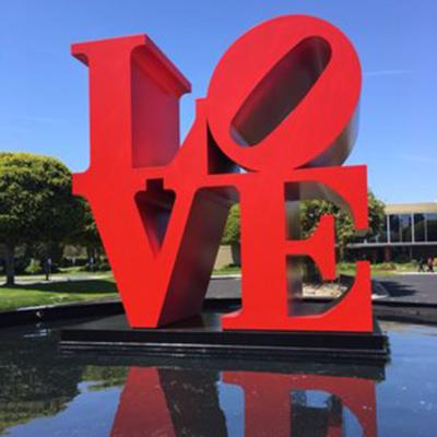 China Die Cutting Printing Stainless Steel Love Sculpture Perfect for Outdoor Garden Decor for sale