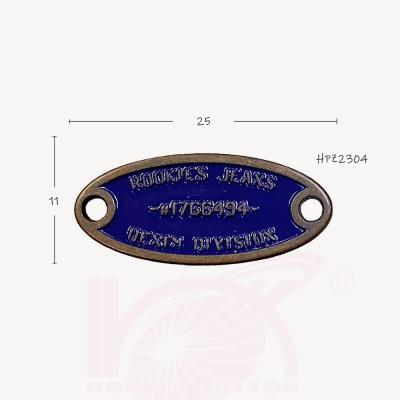 China HPZ2304 25mm Nickel Free Oval Shape Sewing 2 Hole Metal Custom Letter Logo Gold Tags For Bags Clothes for sale