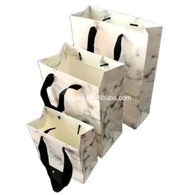 China Recyclable Custom Paper Printing Marble Christmas Food Packaging Gift Bag for sale