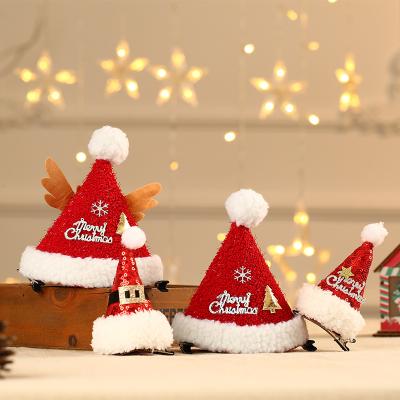 China 2021 Plush Newcomer Christmas Hat Shape Hairpin Kissing Good Luck Celebrating Party for sale