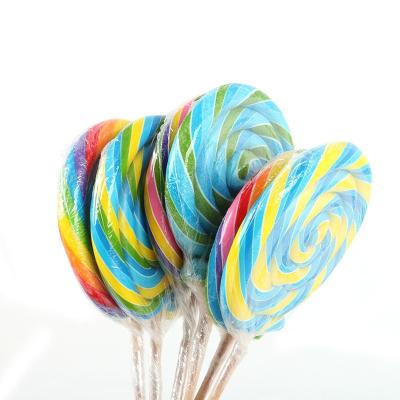 China Rainbow Natural Fruity Lollipop Flavor 150g Muti Color Handmade Round Solid Hard Candy for sale