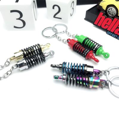 China Wholesale Metal Mini Personalized Shock Absorber Key Ring Key Chain Chain for sale