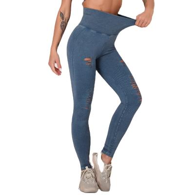 China 2021 New Women's Breathable Seamless Washable Yoga Pants Hollow Out High Waist Hollow Hips Sports Fitness Yoga Sweat-absorbent Breathable Pants for sale